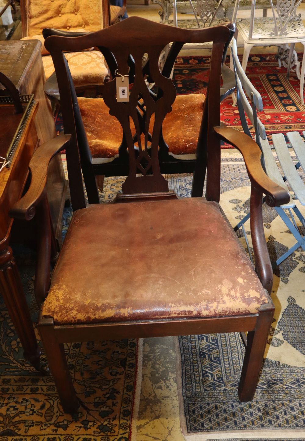 Two George III mahogany elbow chairs